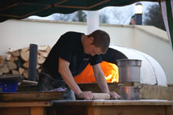 Preparing pizza at The George